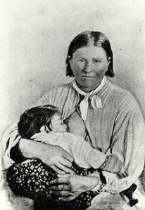 Blue eyed Cynthia Anne Parker with one of her Comanche children